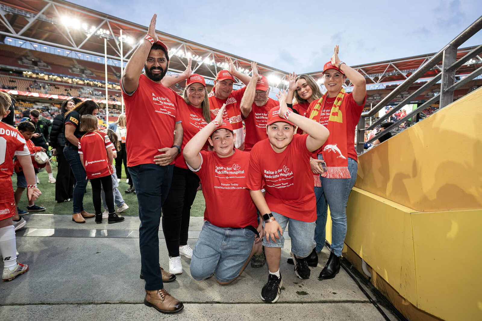 9 Aug Dolphins Raiseit4 Red High Res0005